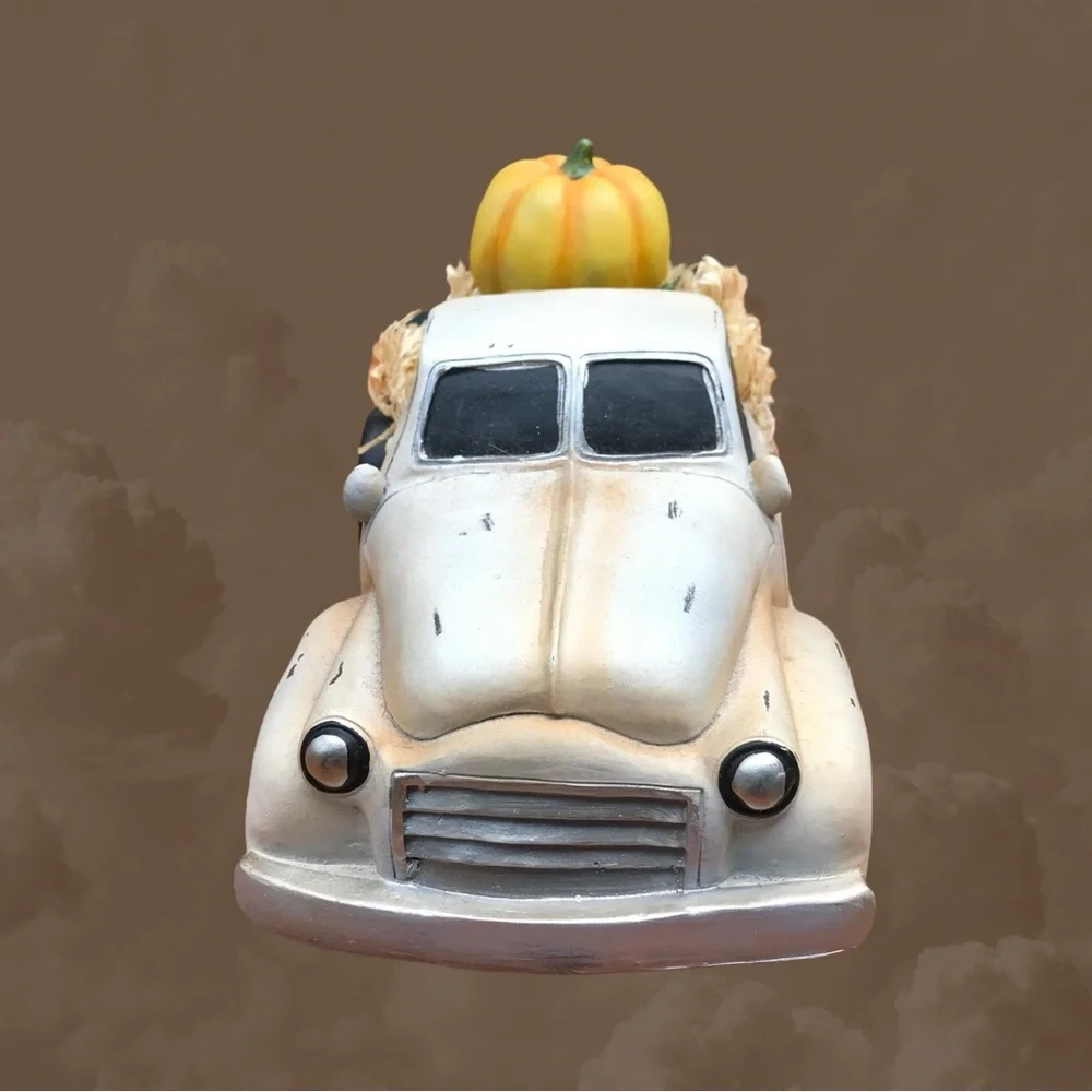 Plow & Hearth in orig.box vintage truck full of pumpkins. Great fall display.